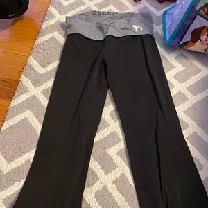 UCONN PINK black yoga pants. Size M.